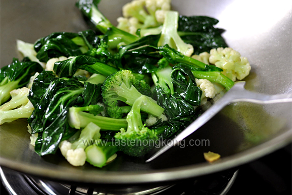 Stir-frying Choy Sum