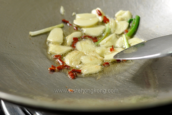 Sauteing Garlic, Chili, Green Onion in Wok