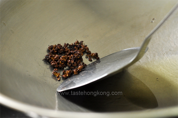 Sauteing Sichuan Peppercorns in Wok