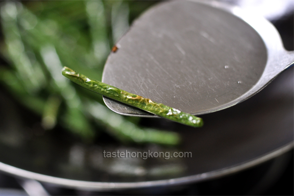 Frying French Beans or Haricots Verts in Wok